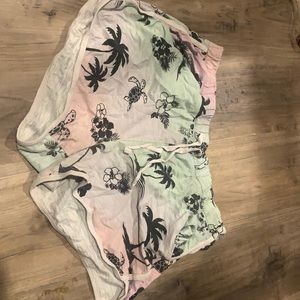 It’s palm tree shorts pink and green ish